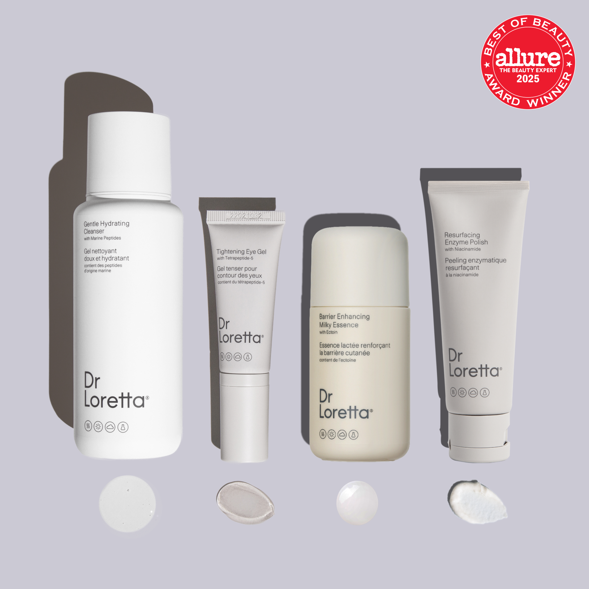 Dr. Loretta skincare products with 'Allure' award on a gray background